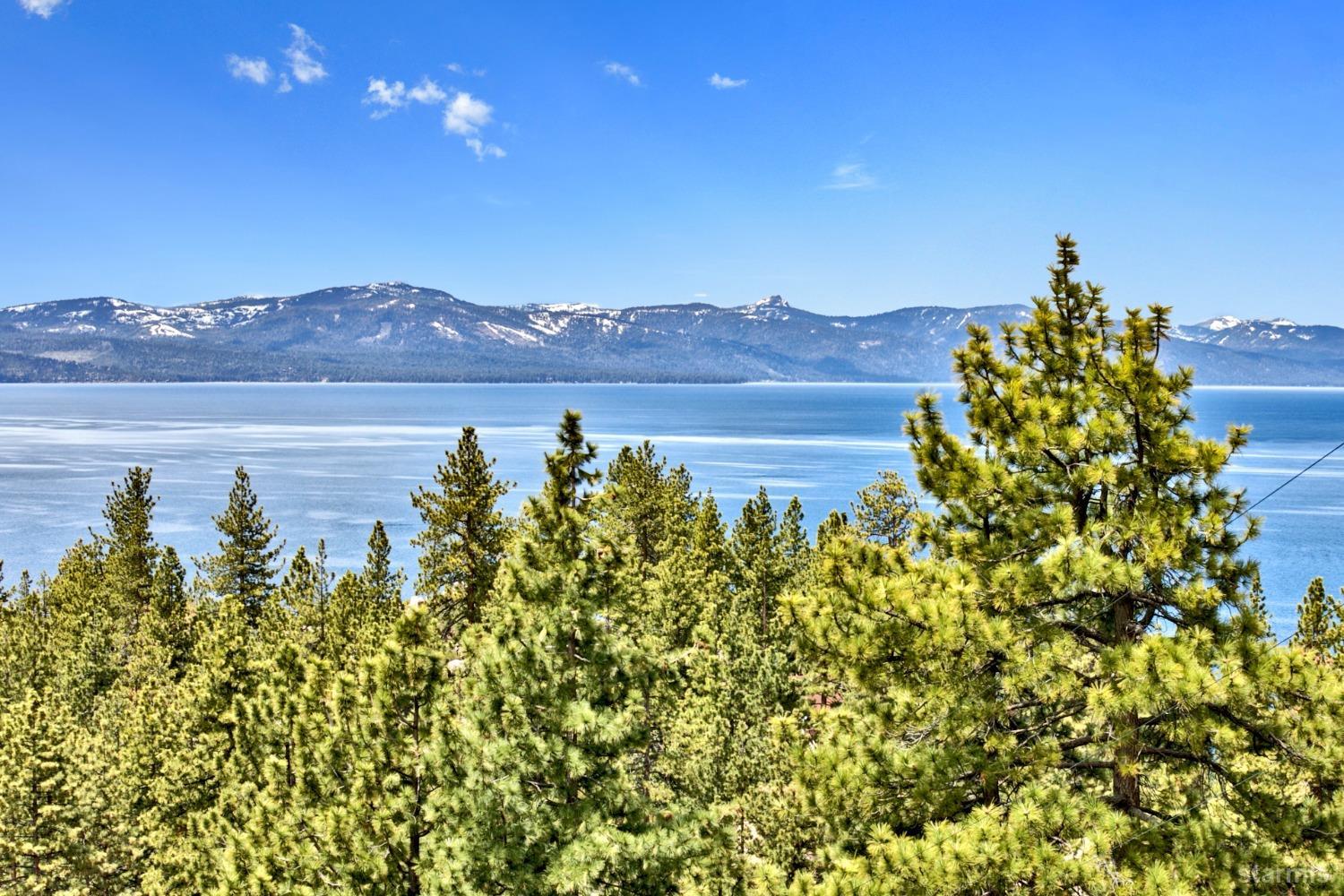 631 Point Road Zephyr Cove, NV 89448 - Photo 15 of 28 a view of a lake with a mountain in the background