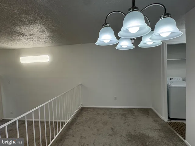 a view of a decorative light in a hallway