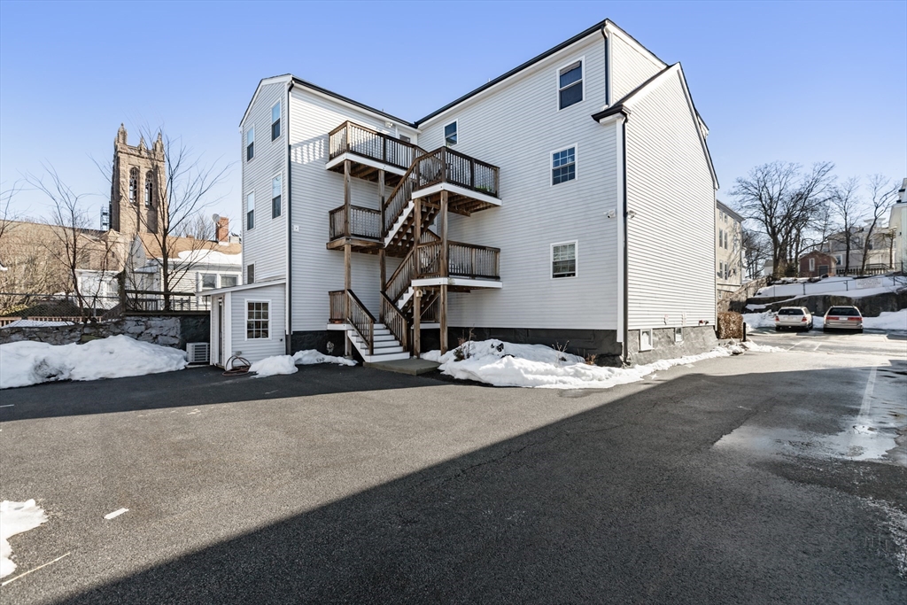 222 Rock Street, Unit 2 Fall River, MA 02720 - Photo 17 of 21 a view of a house with a street