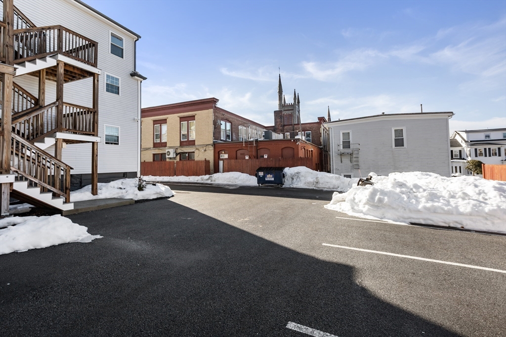222 Rock Street, Unit 2 Fall River, MA 02720 - Photo 20 of 21 a front view of a house with basket ball court