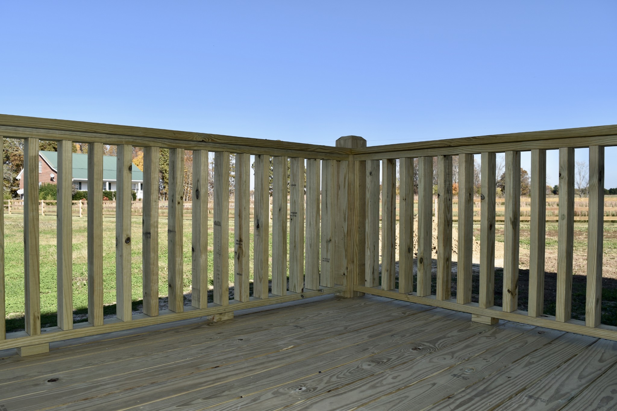 151 East Carter Road Portland, TN 37148 - Photo 13 of 14 a view of a balcony with wooden floor and fence