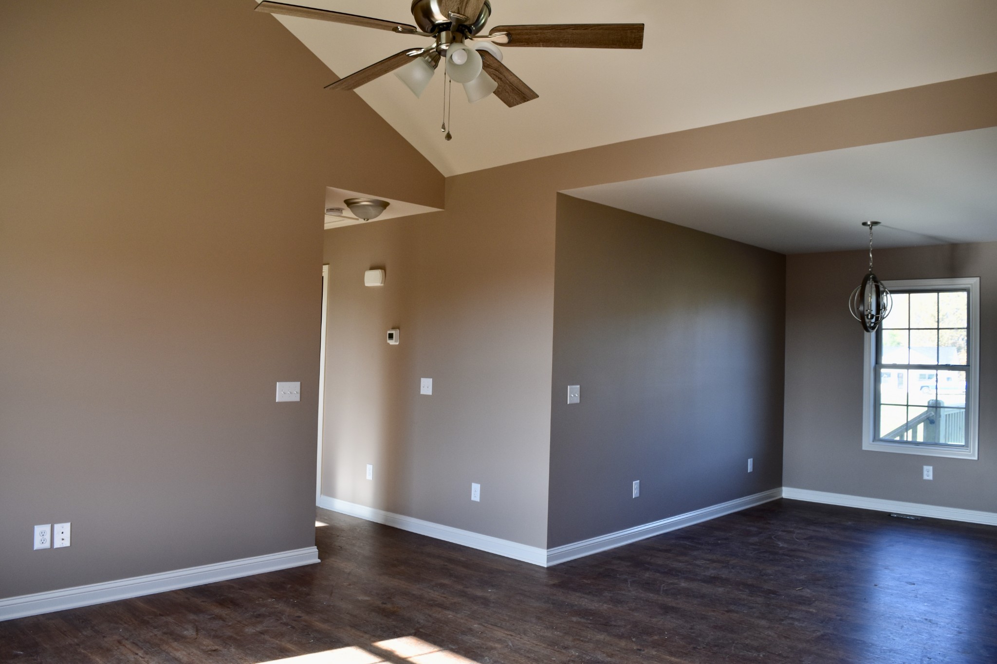 151 East Carter Road Portland, TN 37148 - Photo 3 of 14 an empty room with wooden floor closet and windows