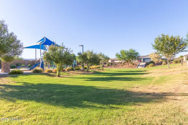 a view of a golf course with a park
