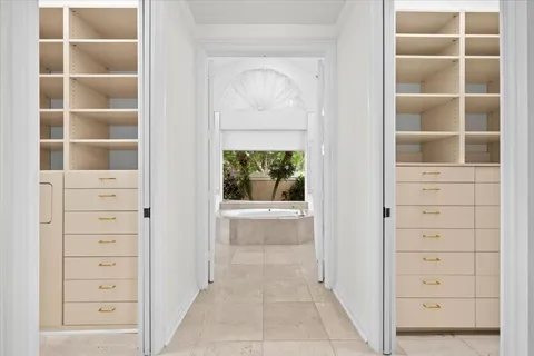 a view of an empty walk in closet