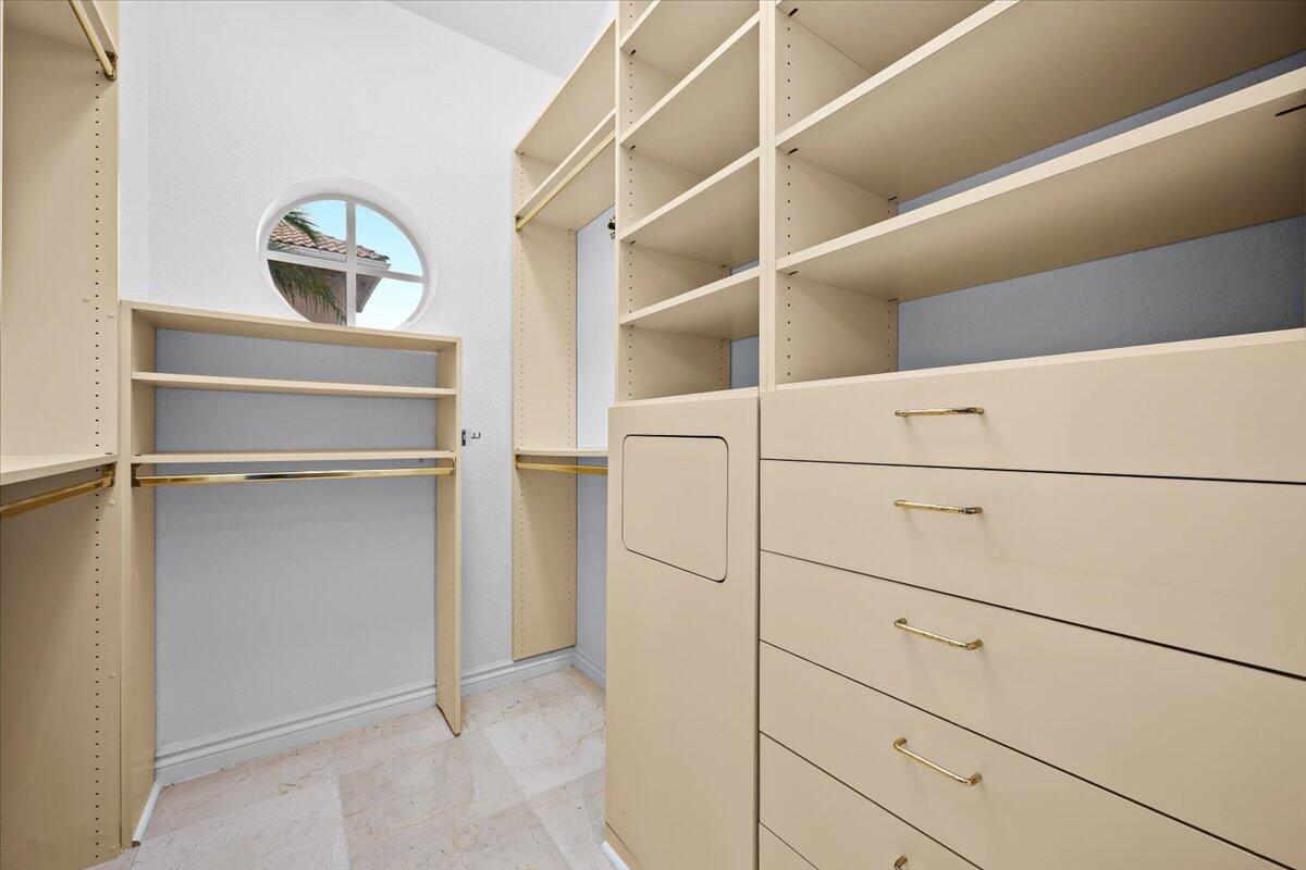 3241 Northwest 63rd Street Boca Raton, FL 33496 - Photo 37 of 75 a view of an empty walk in closet