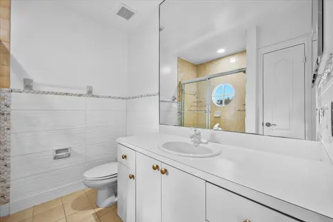 an aerial view of a house with a garden