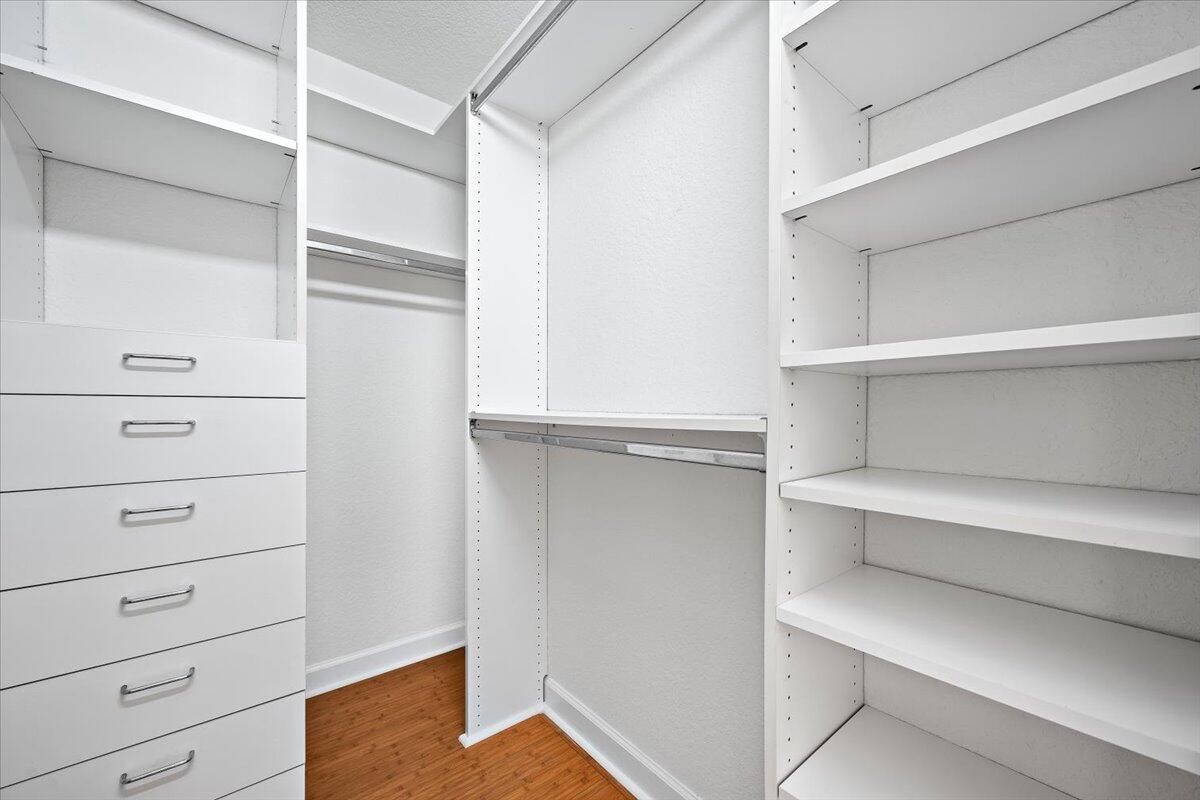 3241 Northwest 63rd Street Boca Raton, FL 33496 - Photo 53 of 75 a view of an empty walk in closet