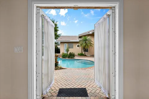 a view of living room with furniture and a fireplace