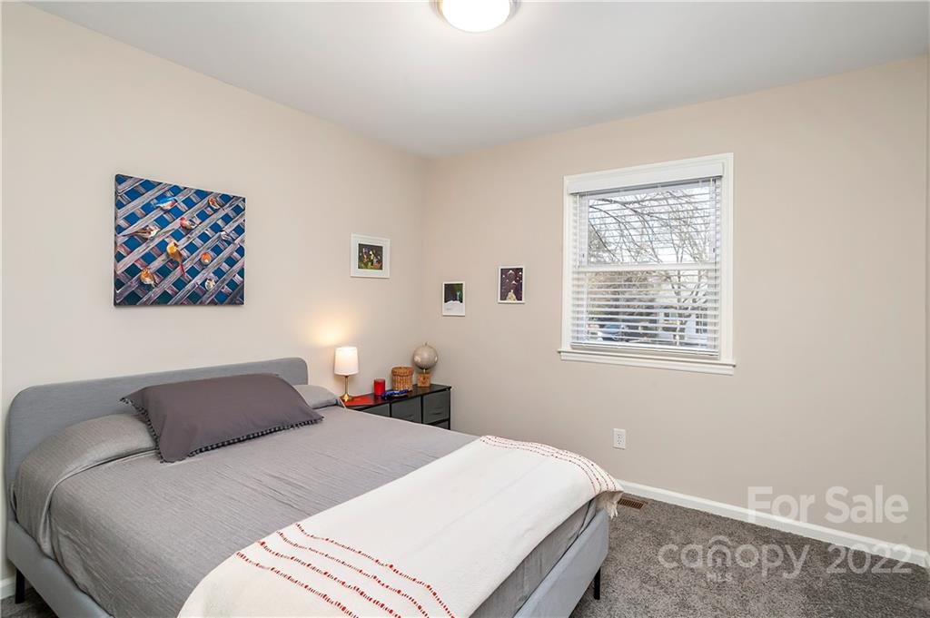 6009 Pepperhill Road Charlotte, NC 28212 - Photo 11 of 17 a bedroom with a bed and a window
