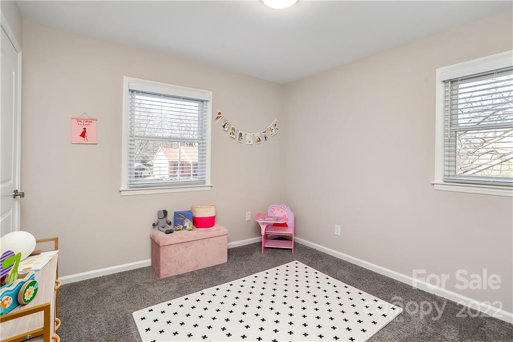 6009 Pepperhill Road Charlotte, NC 28212 - Photo 12 of 17 a bedroom with a bed and a window