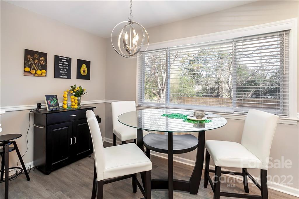 6009 Pepperhill Road Charlotte, NC 28212 - Photo 5 of 17 a view of a dining room with furniture window and outside view
