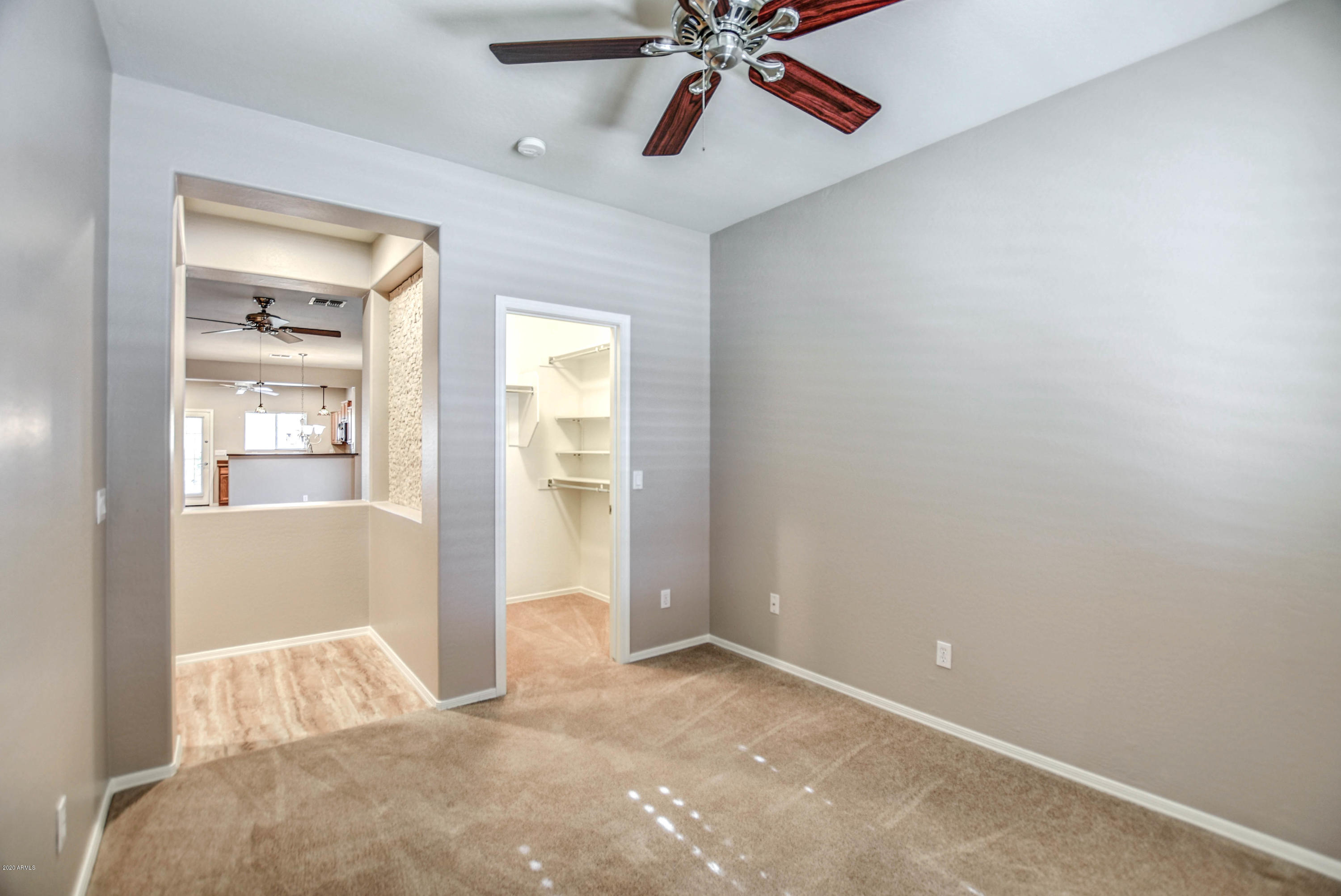 7582 West Springfield Way Florence, AZ 85132 - Photo 19 of 42 Den with huge closet