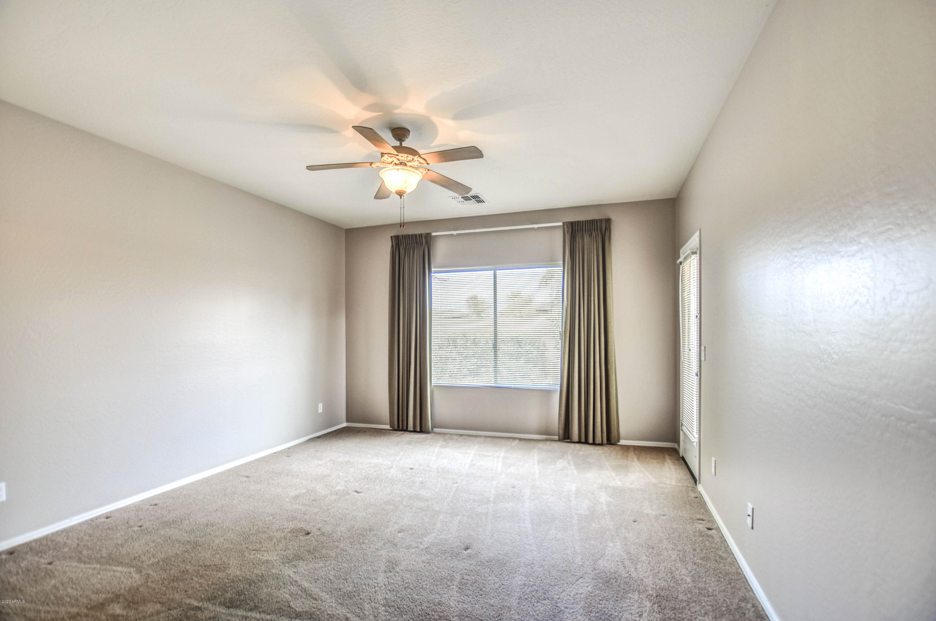 7582 West Springfield Way Florence, AZ 85132 - Photo 21 of 42 Master bedroom