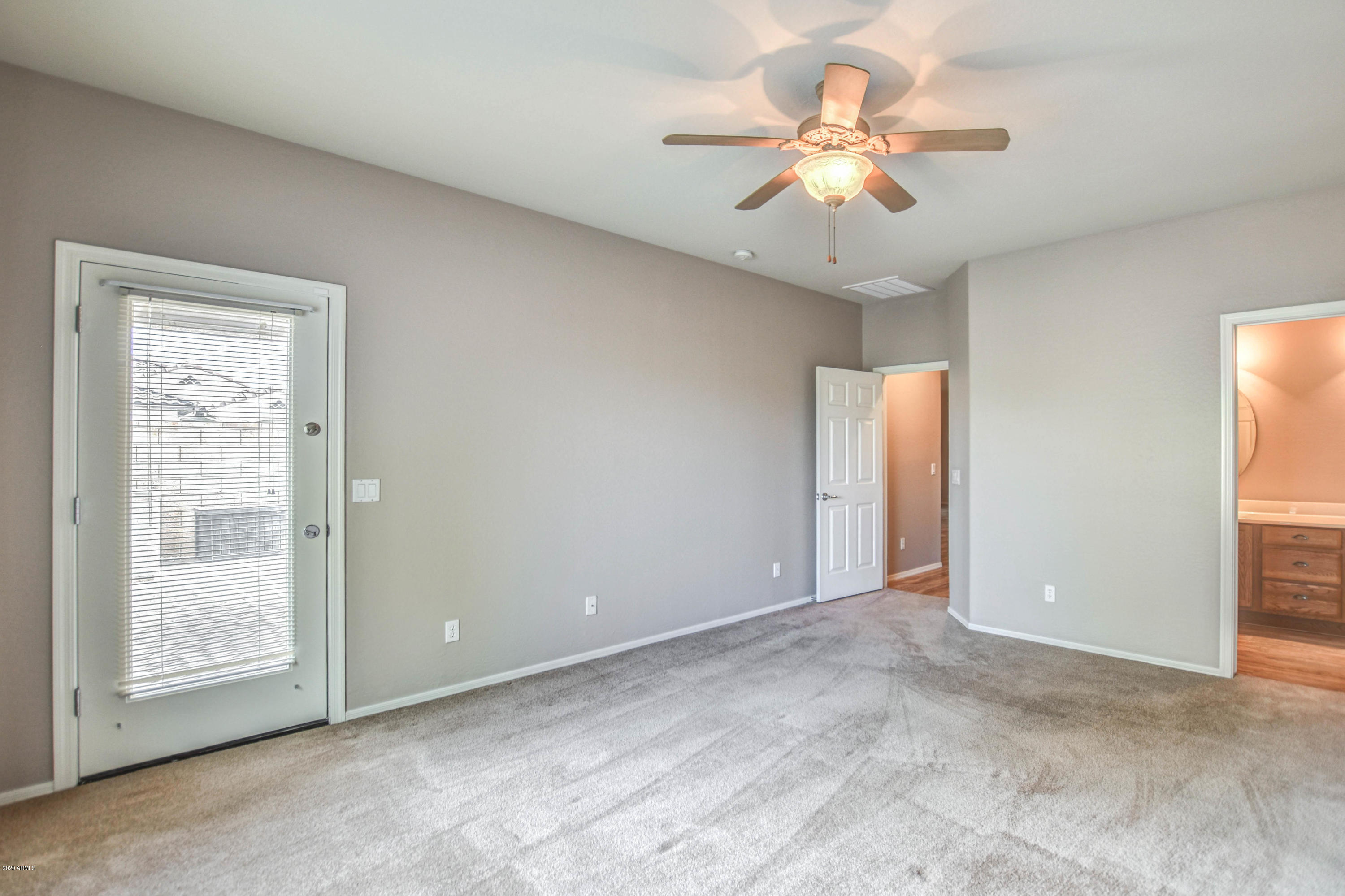 7582 West Springfield Way Florence, AZ 85132 - Photo 22 of 42 Master bedroom
