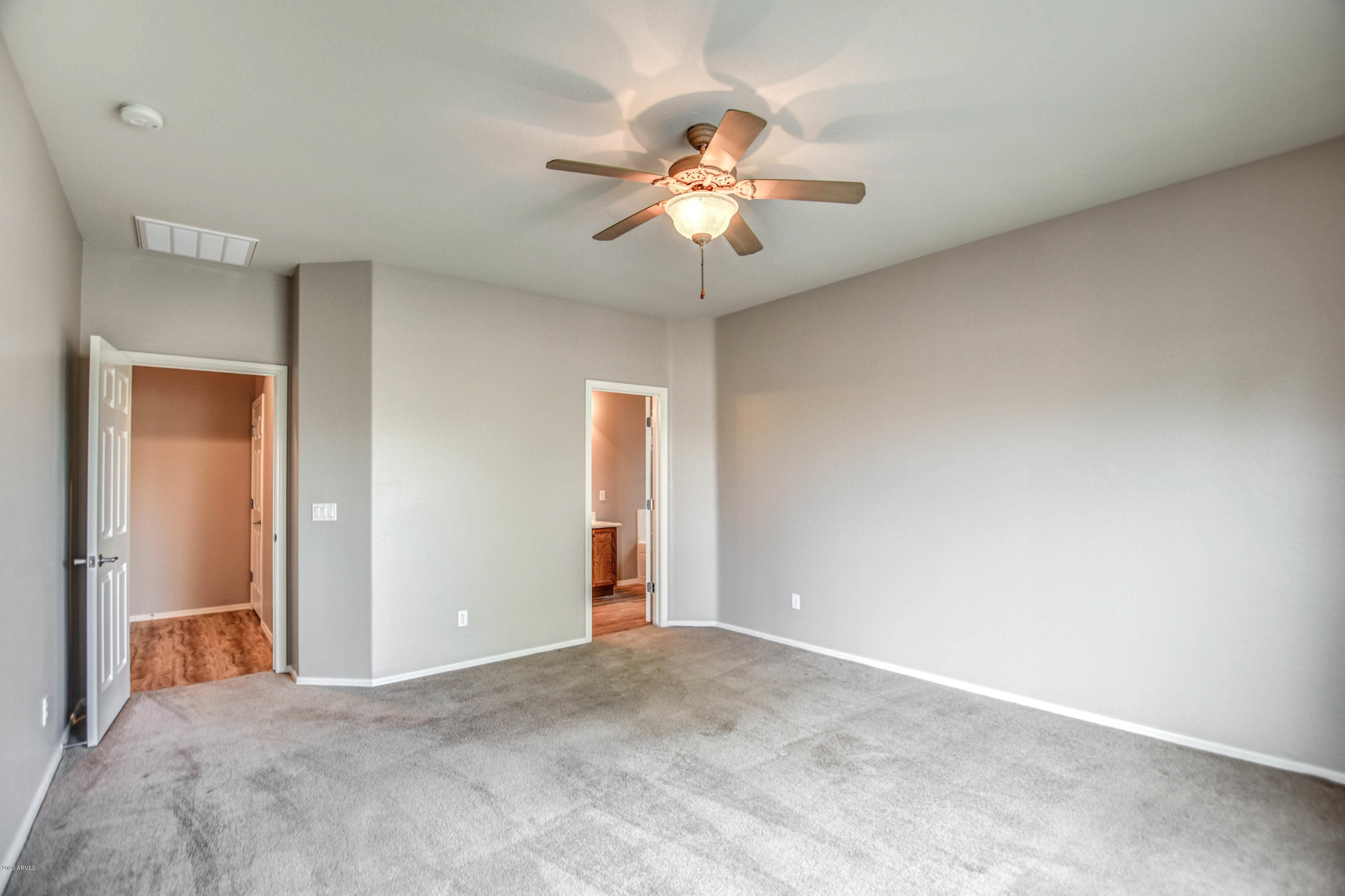 7582 West Springfield Way Florence, AZ 85132 - Photo 23 of 42 Master bedroom