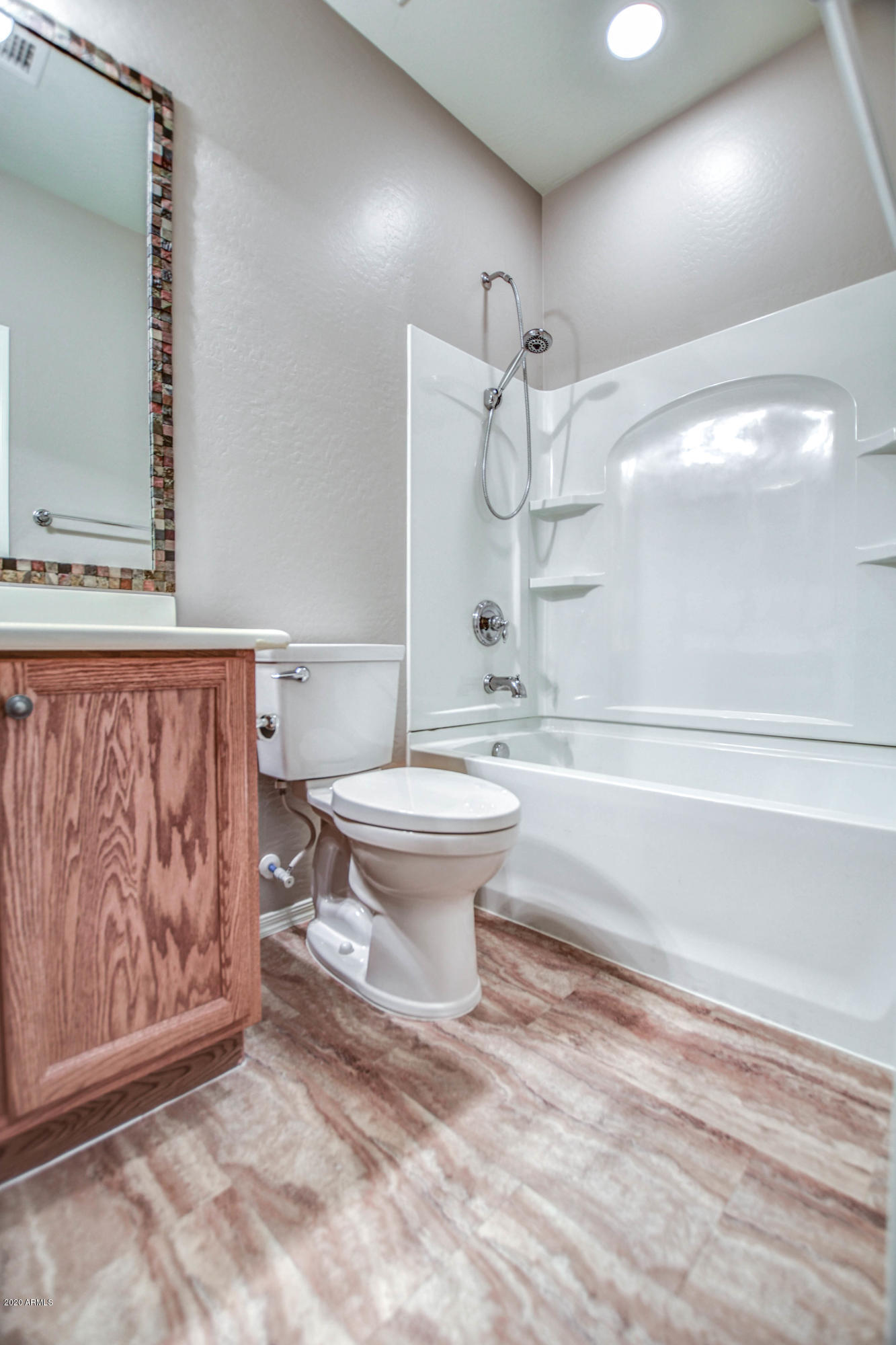 7582 West Springfield Way Florence, AZ 85132 - Photo 31 of 42 Hall bathroom