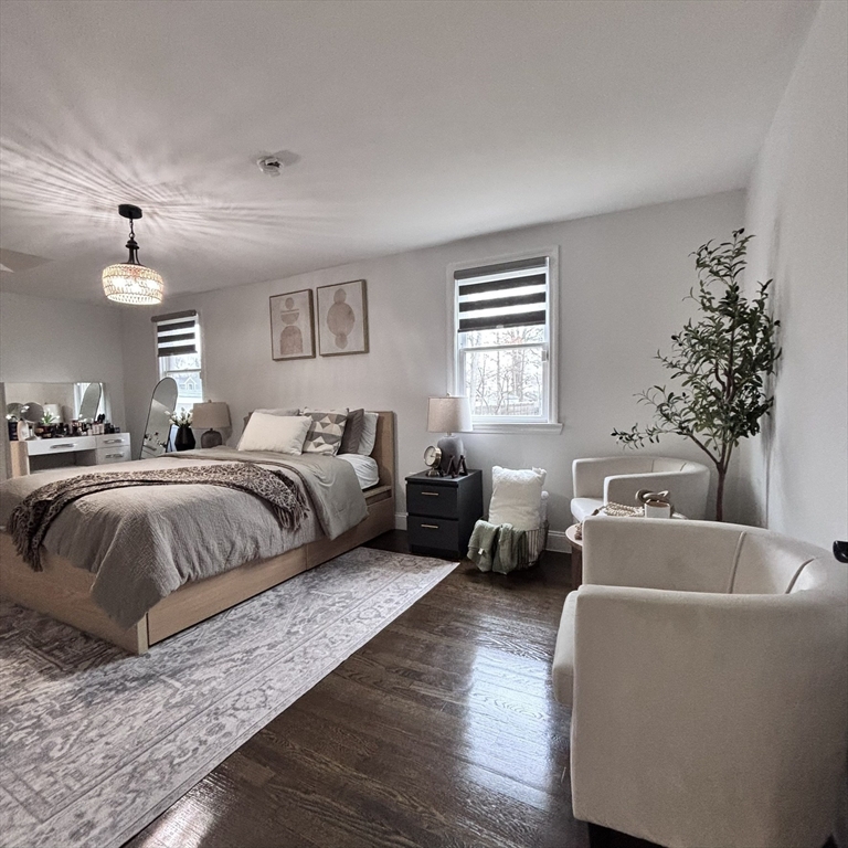 20 Morgan Road Holbrook, MA 02343 - Photo 13 of 21 a spacious bedroom with a bed and a couch