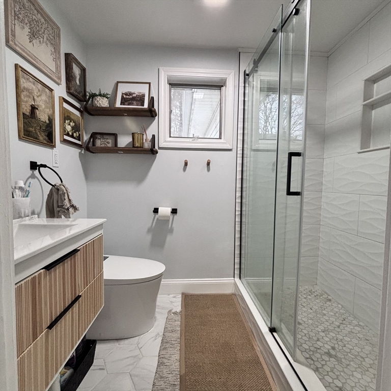 20 Morgan Road Holbrook, MA 02343 - Photo 20 of 21 a bathroom with a sink toilet and shower