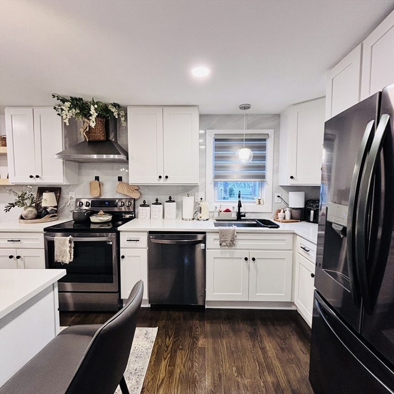 20 Morgan Road Holbrook, MA 02343 - Photo 10 of 21 a kitchen with white cabinets and appliances