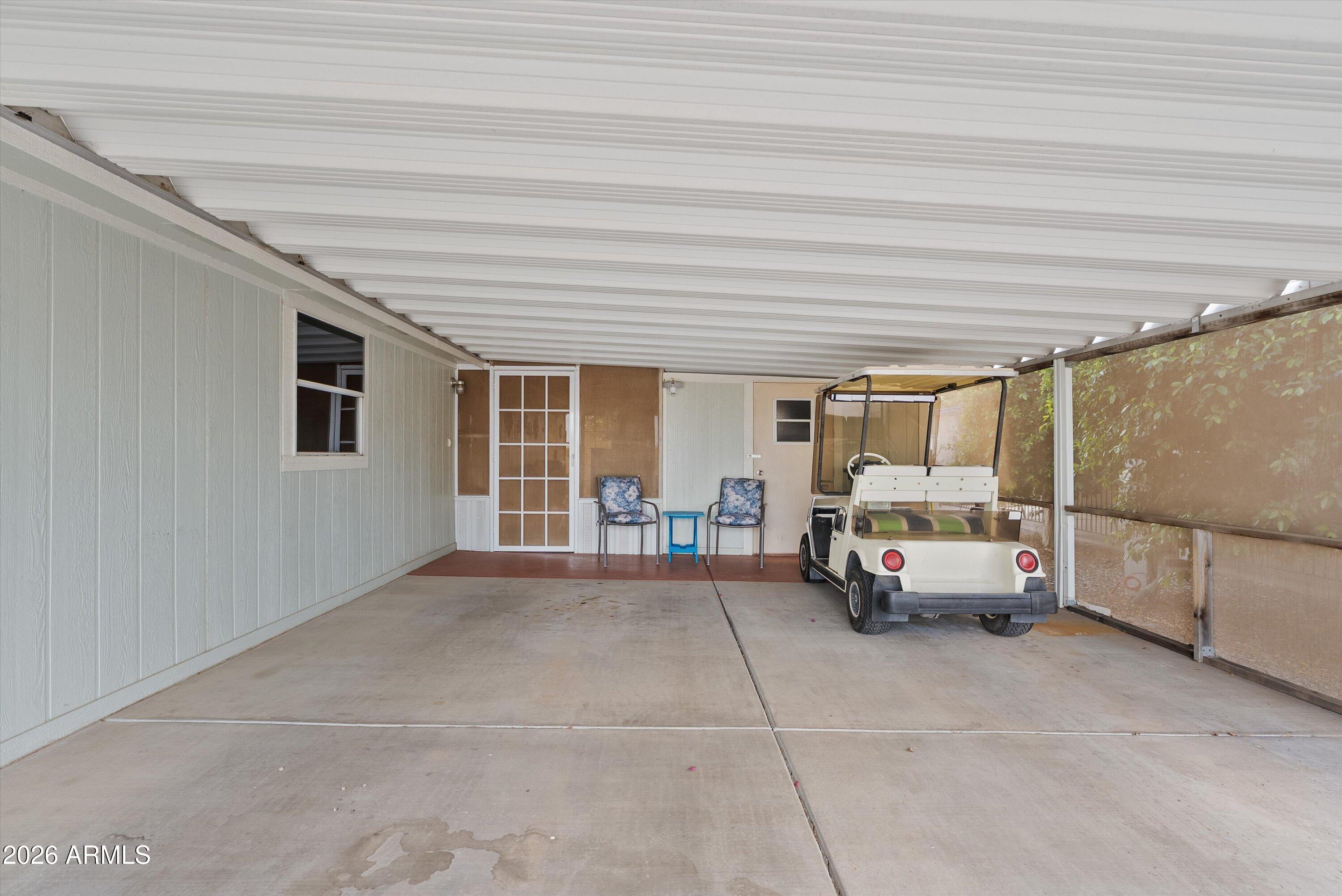 3700 South Tomahawk Road, Unit 91 Apache Junction, AZ 85119 - Photo 3 of 29 a car parked in front of house