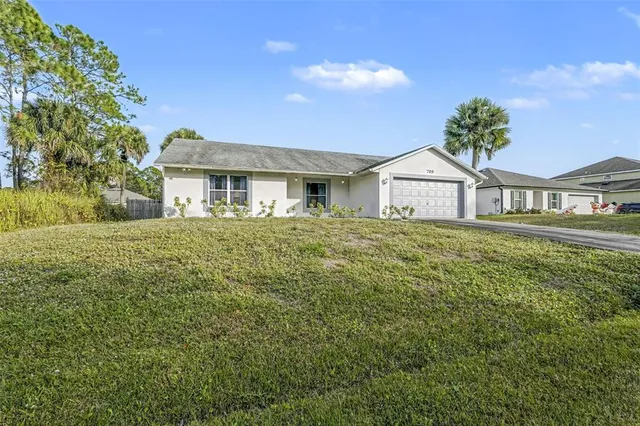 $320,000 | 709 Haryestor Avenue Southwest, Palm Bay, FL 32908