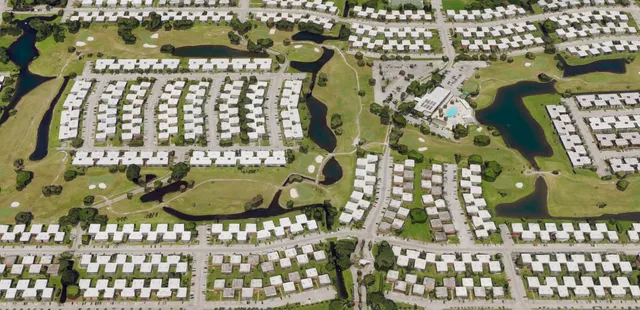 a view of a garden with a house