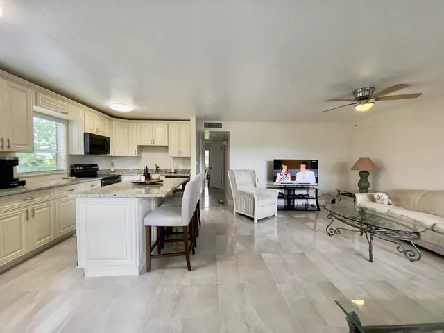 a view of a door and a window