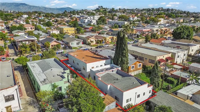 an aerial view of a city with lots of residential buildings