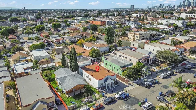 an aerial view of a city with lots of residential buildings