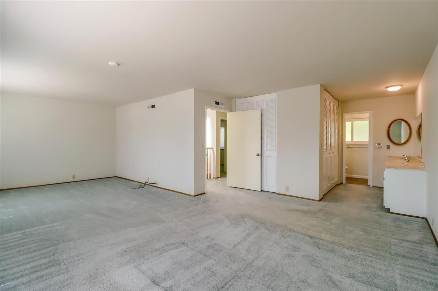 6908 Burnside Drive San Jose, CA 95120 - Photo 18 of 37 an empty room with window and mirror