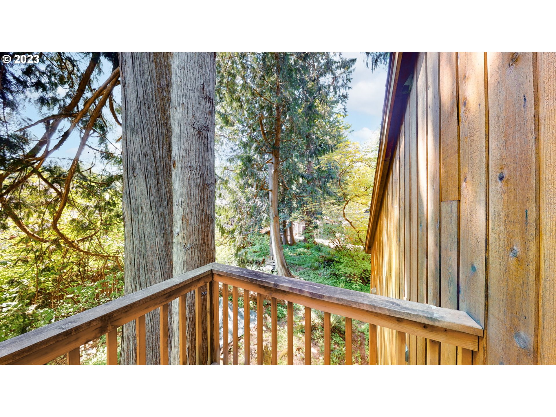 65582 East Timberline Drive Rhododendron, OR 97049 - Photo 22 of 48 a black and white photo of a balcony