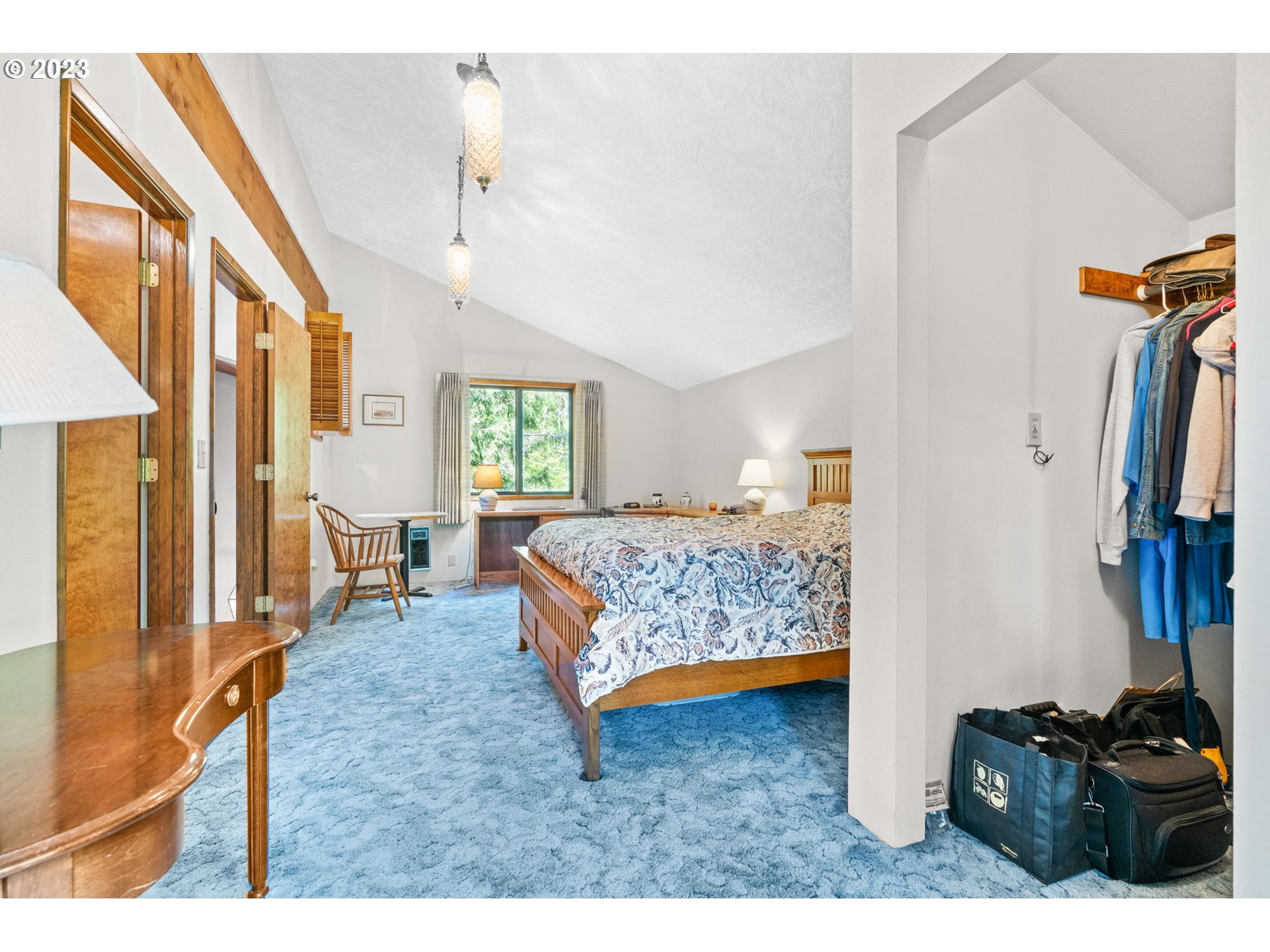 65582 East Timberline Drive Rhododendron, OR 97049 - Photo 24 of 48 a bedroom with furniture and a window