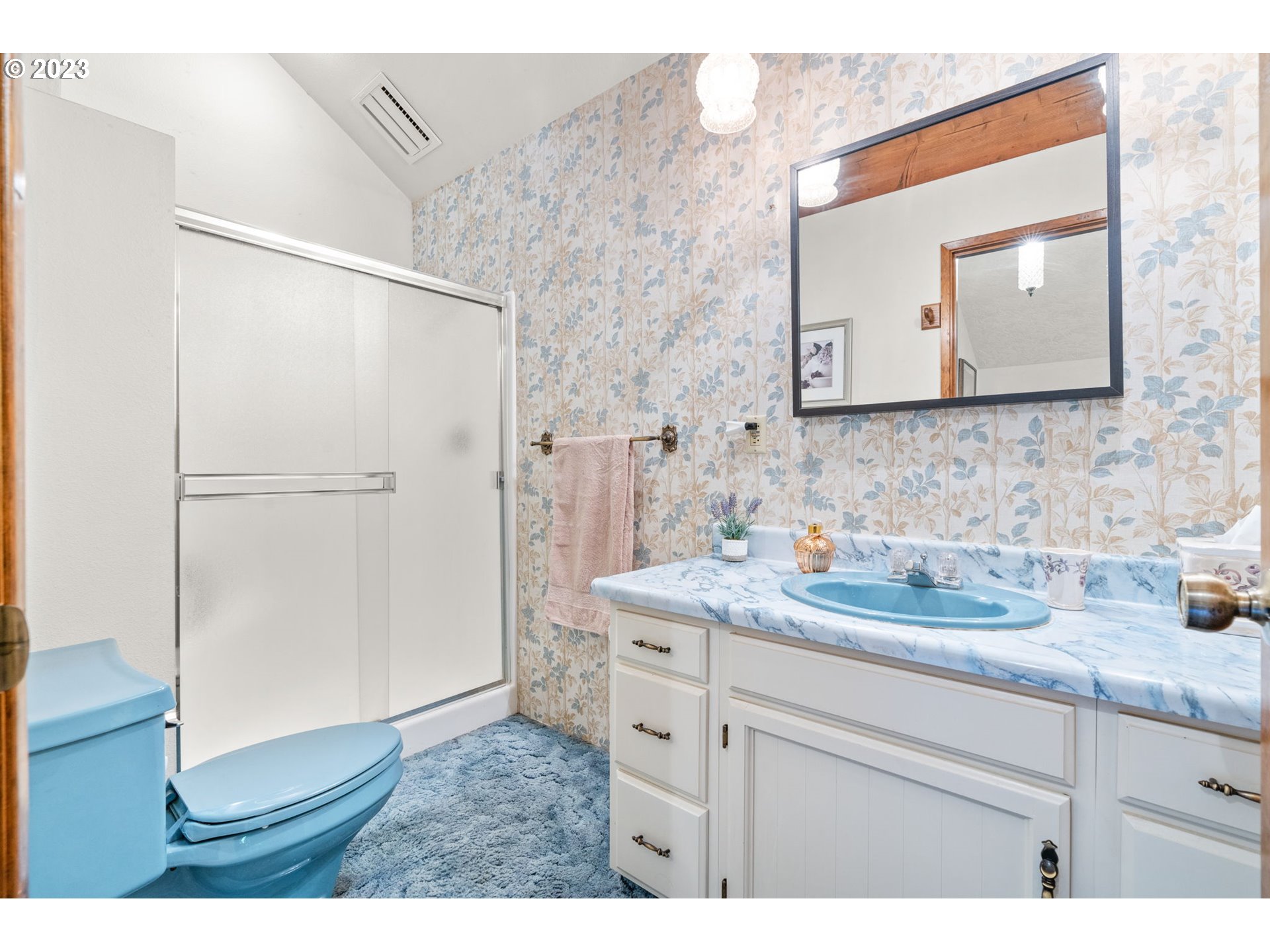 65582 East Timberline Drive Rhododendron, OR 97049 - Photo 26 of 48 a bathroom with a granite countertop sink mirror and a toilet
