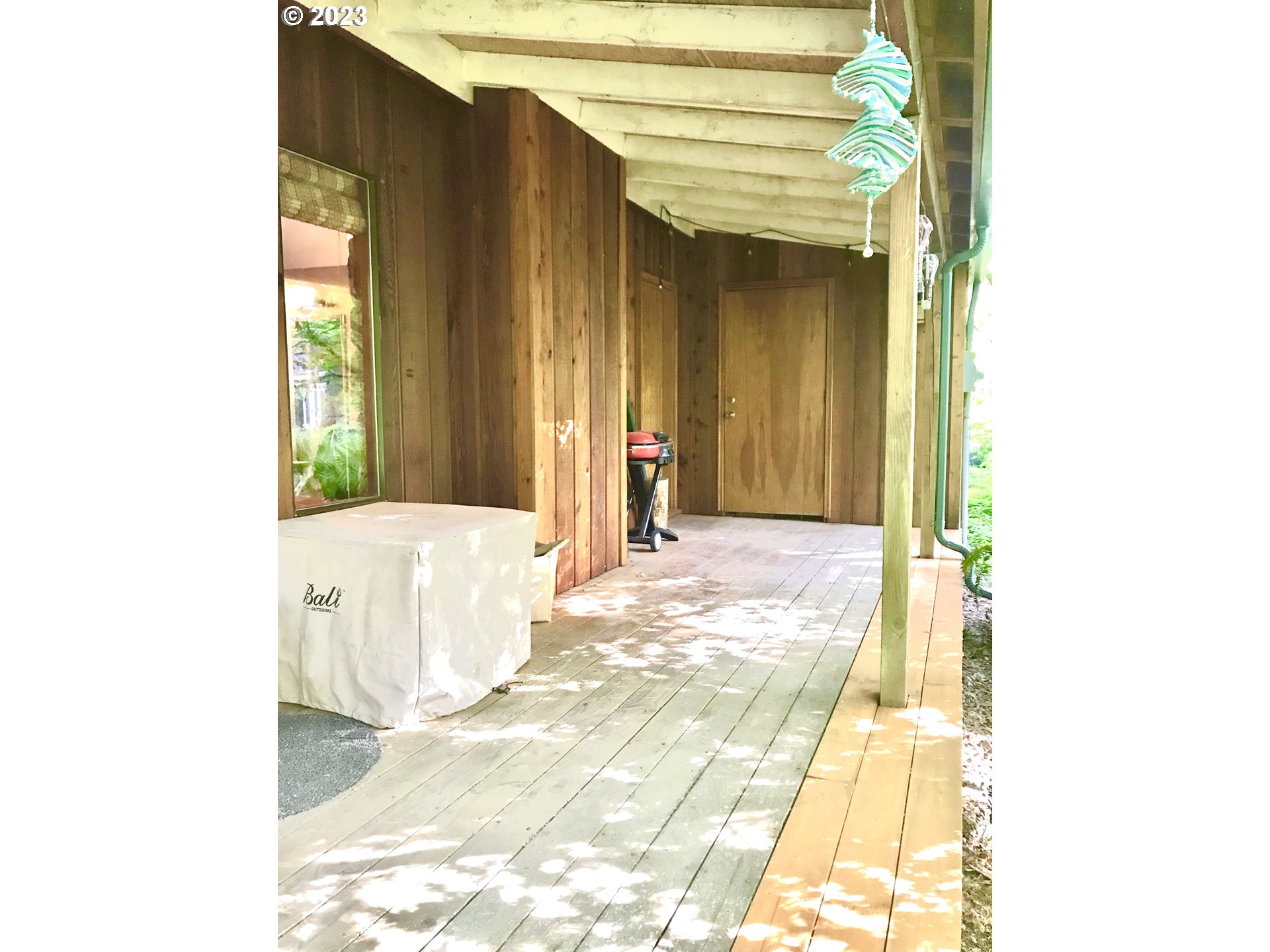 65582 East Timberline Drive Rhododendron, OR 97049 - Photo 30 of 48 a bedroom with a bed and a window