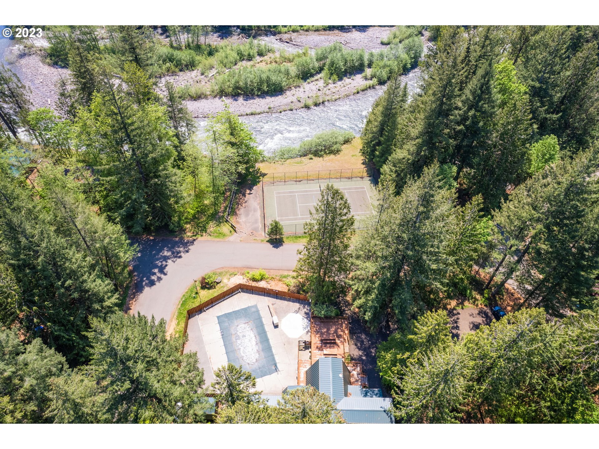 65582 East Timberline Drive Rhododendron, OR 97049 - Photo 37 of 48 an aerial view of residential house with outdoor space and swimming pool