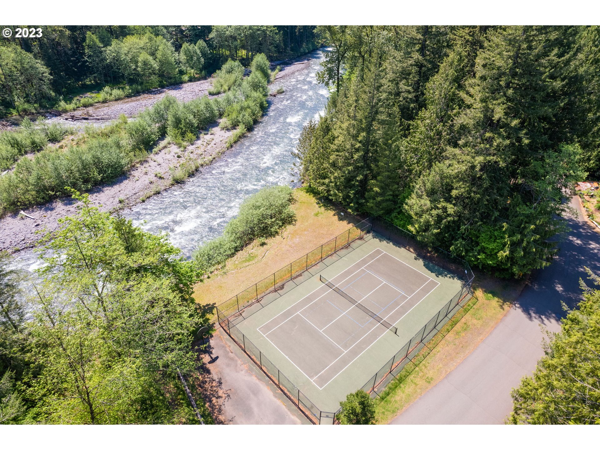 65582 East Timberline Drive Rhododendron, OR 97049 - Photo 38 of 48 a view of a house with a yard