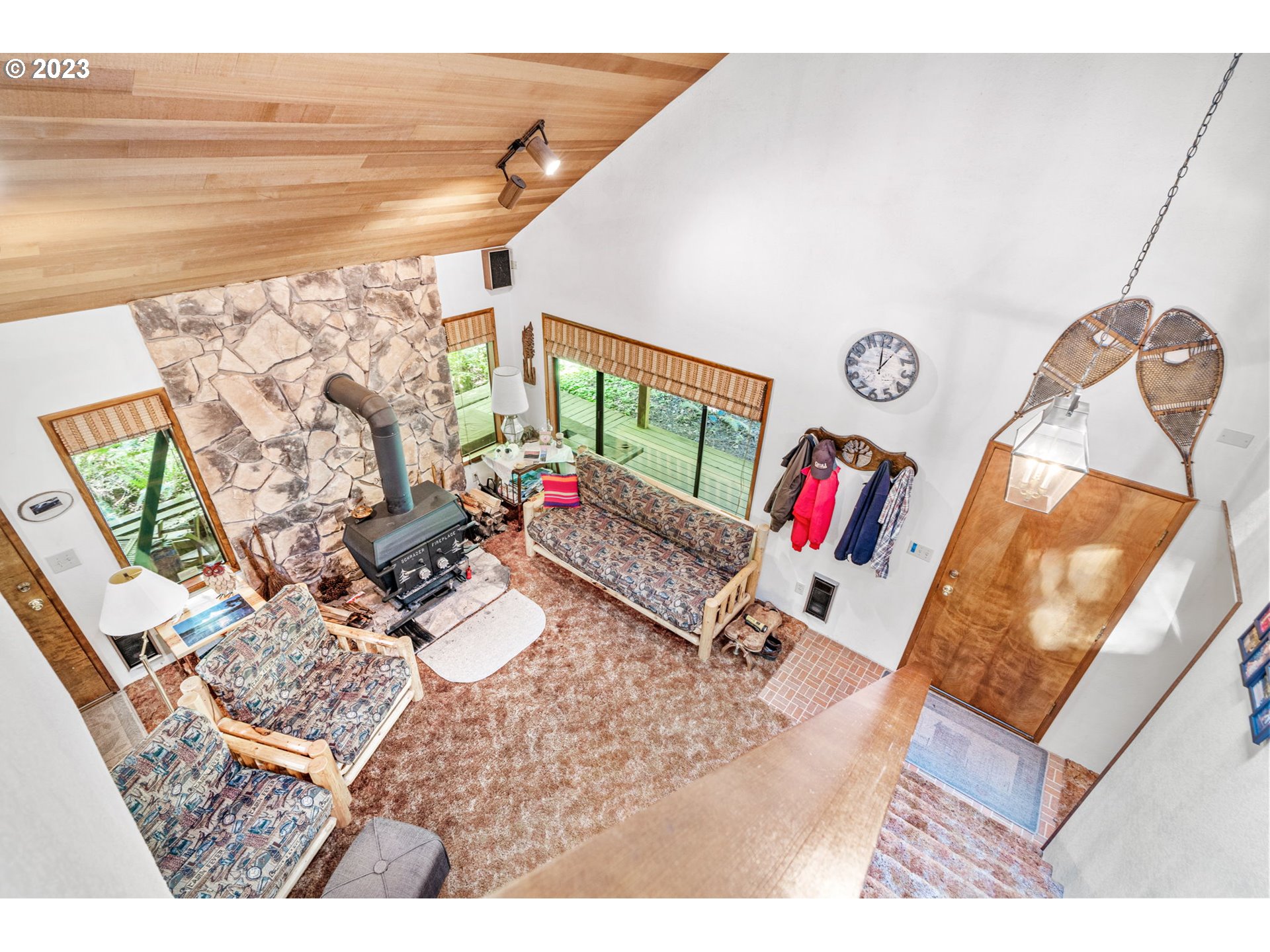 65582 East Timberline Drive Rhododendron, OR 97049 - Photo 10 of 48 a living room with furniture and a wooden floor