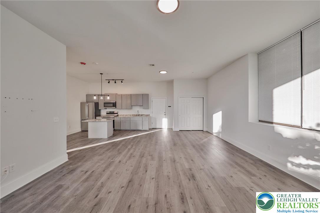 10 West Goepp Street, Unit 207 Bethlehem, PA 18018 - Photo 13 of 24 a view of a kitchen with wooden floor