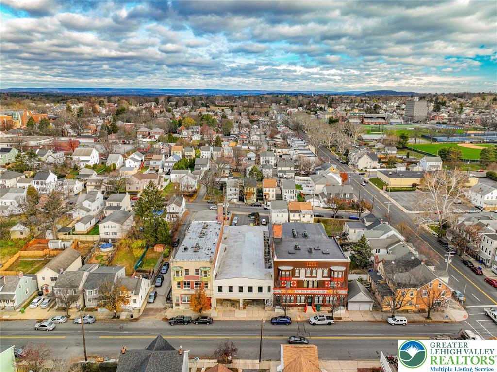 10 West Goepp Street, Unit 207 Bethlehem, PA 18018 - Photo 3 of 24 an aerial view of residential building with parking