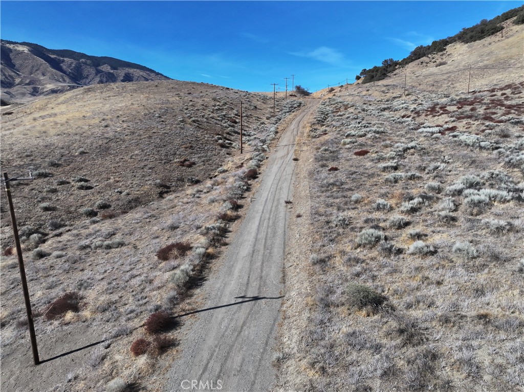 0 Golden State Lebec, CA 93243 - Photo 5 of 23 a view of a dry yard with mountains in the background