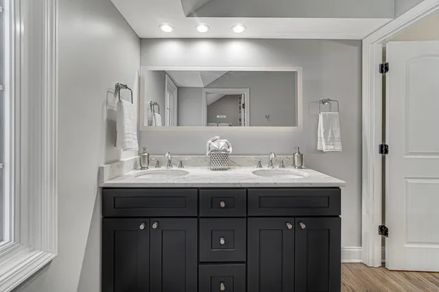 a bathroom with a toilet and a bathtub