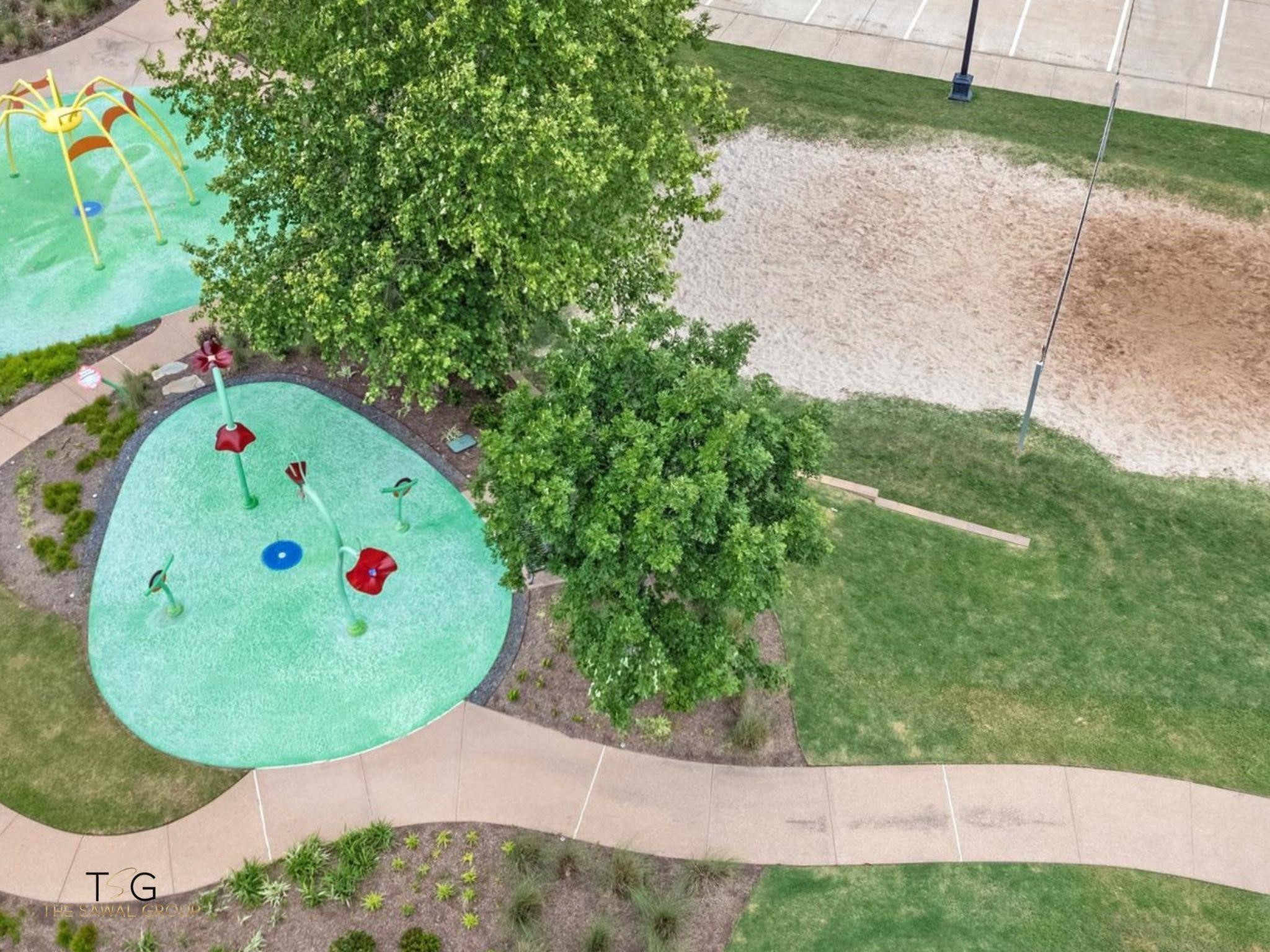 5403 Rouchel Brook Lane Sugar Land, TX 77479 - Photo 41 of 42 Riverstone offers pools, splash pads, volleyball court, tennis courts, and pickleball courts!