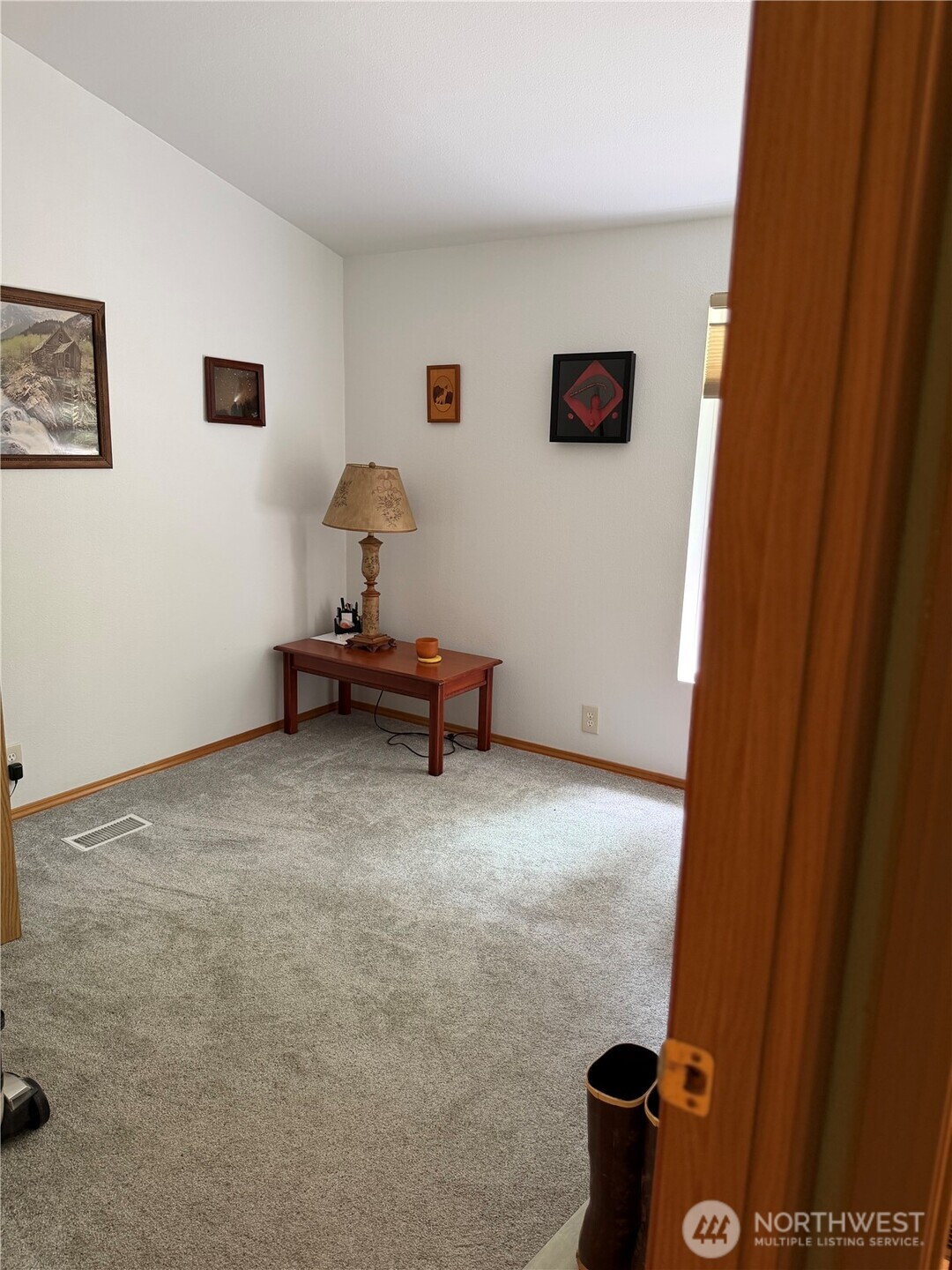 1171 Ray Hicks Street Raymond, WA 98577 - Photo 15 of 33 a living room with furniture and a window