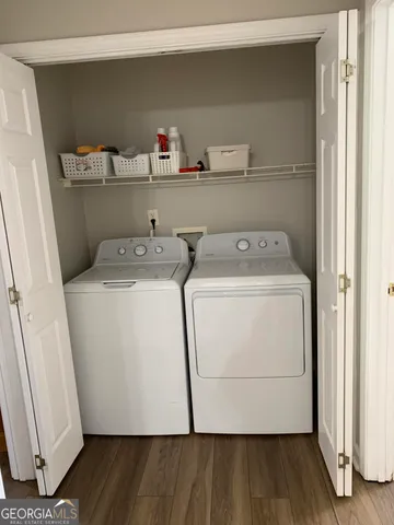 a utility room with dryer and washer