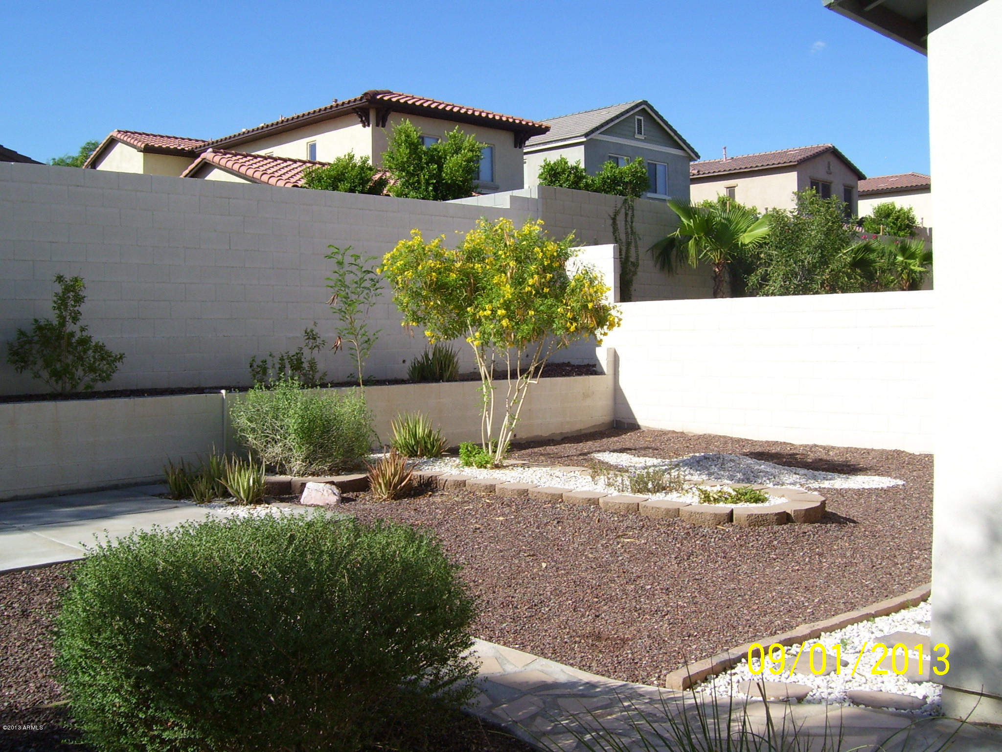 20828 West Ridge Road Buckeye, AZ 85396 - Photo 4 of 27 Landscaped Backyard