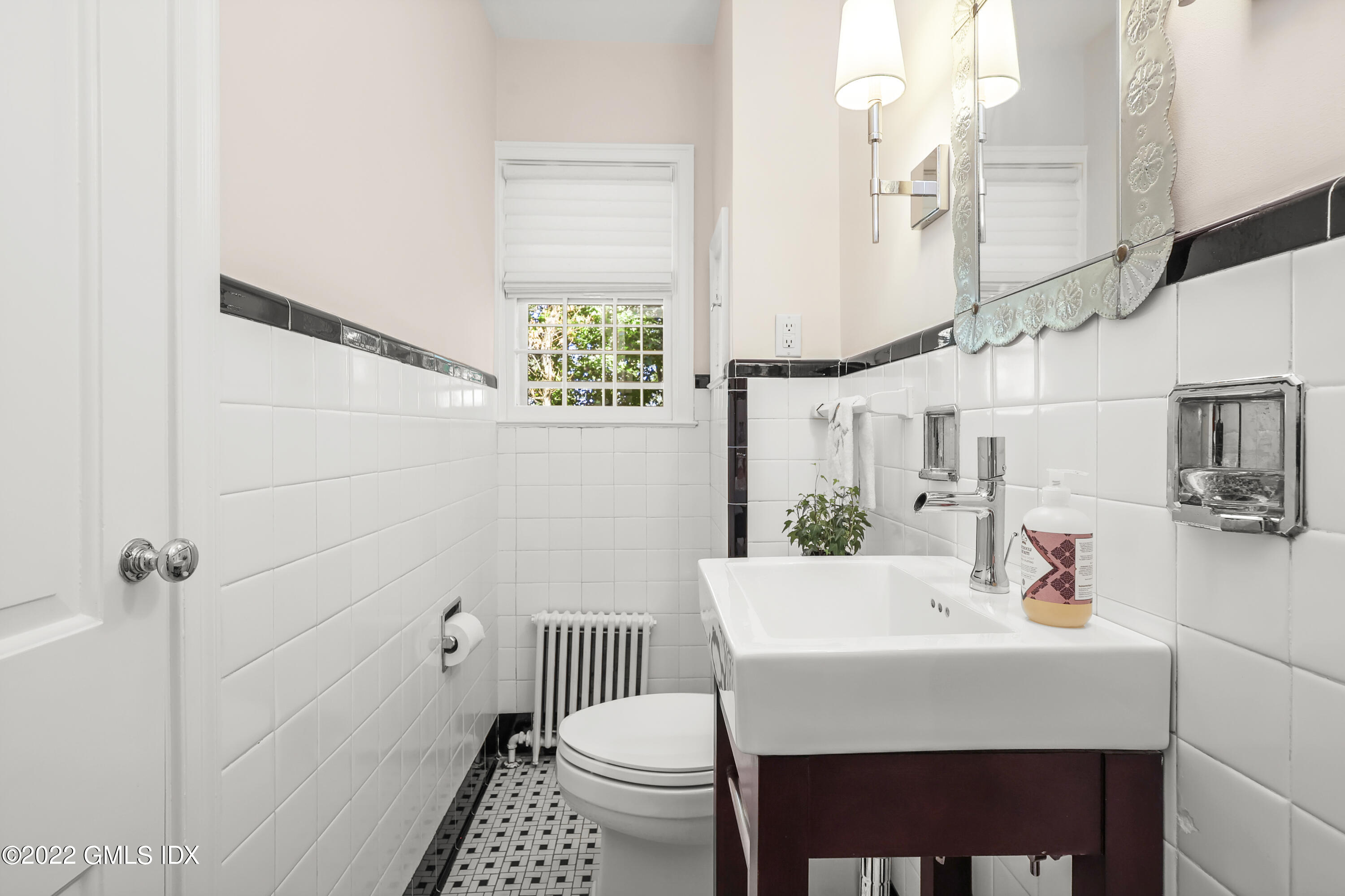 141 Hendrie Avenue Riverside, CT 06878 - Photo 15 of 34 a bathroom with a sink toilet and shower