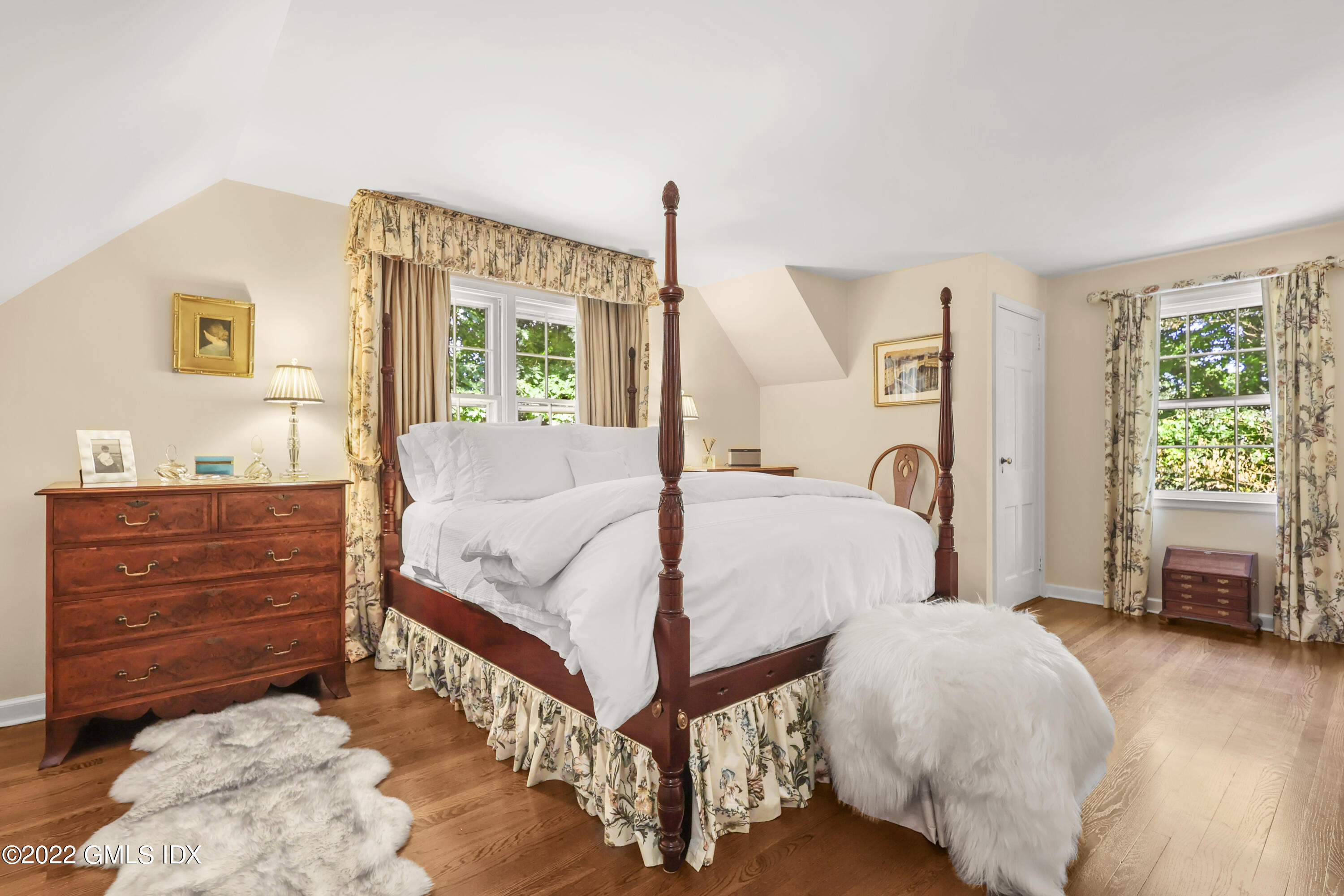 141 Hendrie Avenue Riverside, CT 06878 - Photo 19 of 34 a bed room with a bed and a window
