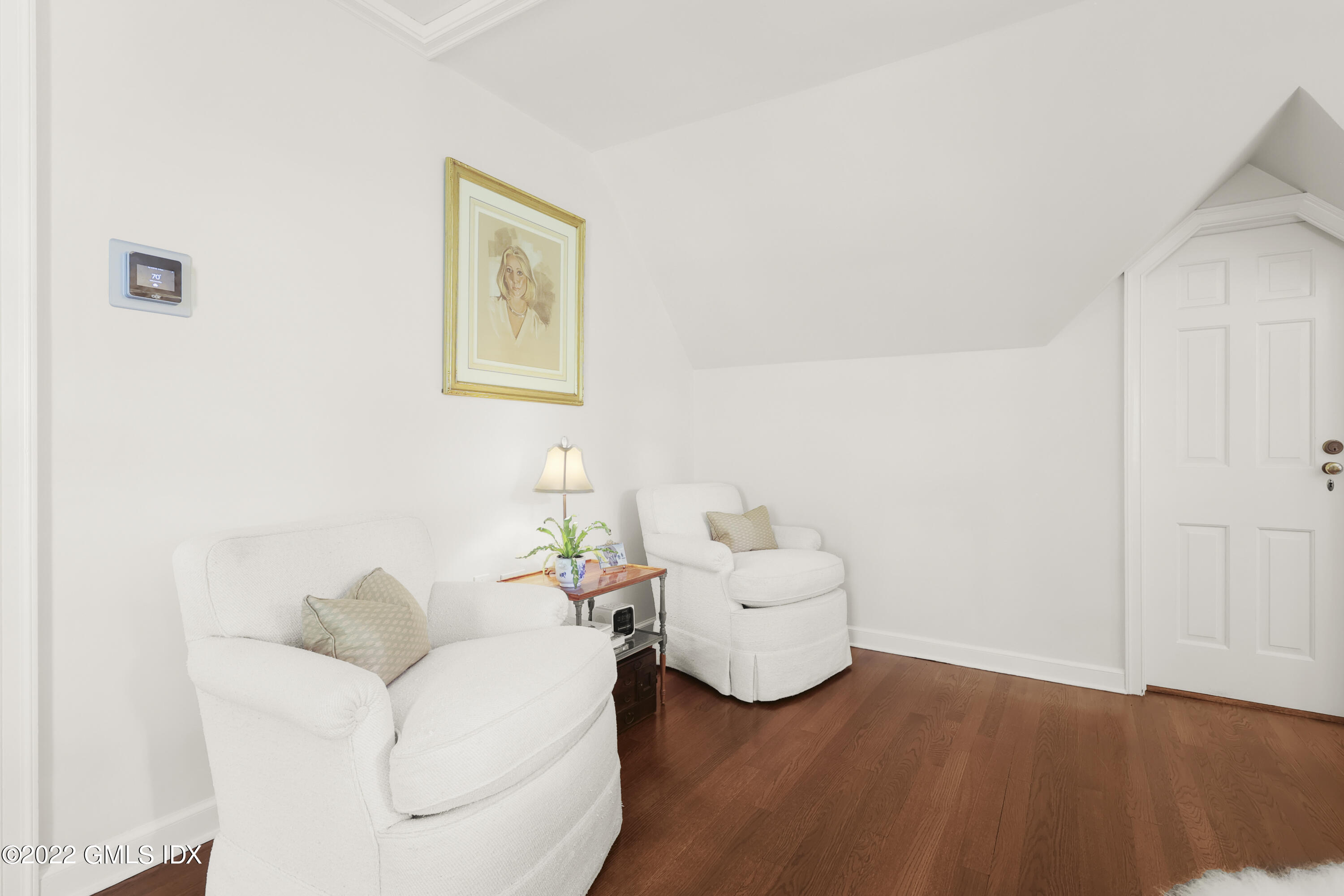 141 Hendrie Avenue Riverside, CT 06878 - Photo 20 of 34 a living room with furniture and a wooden floor