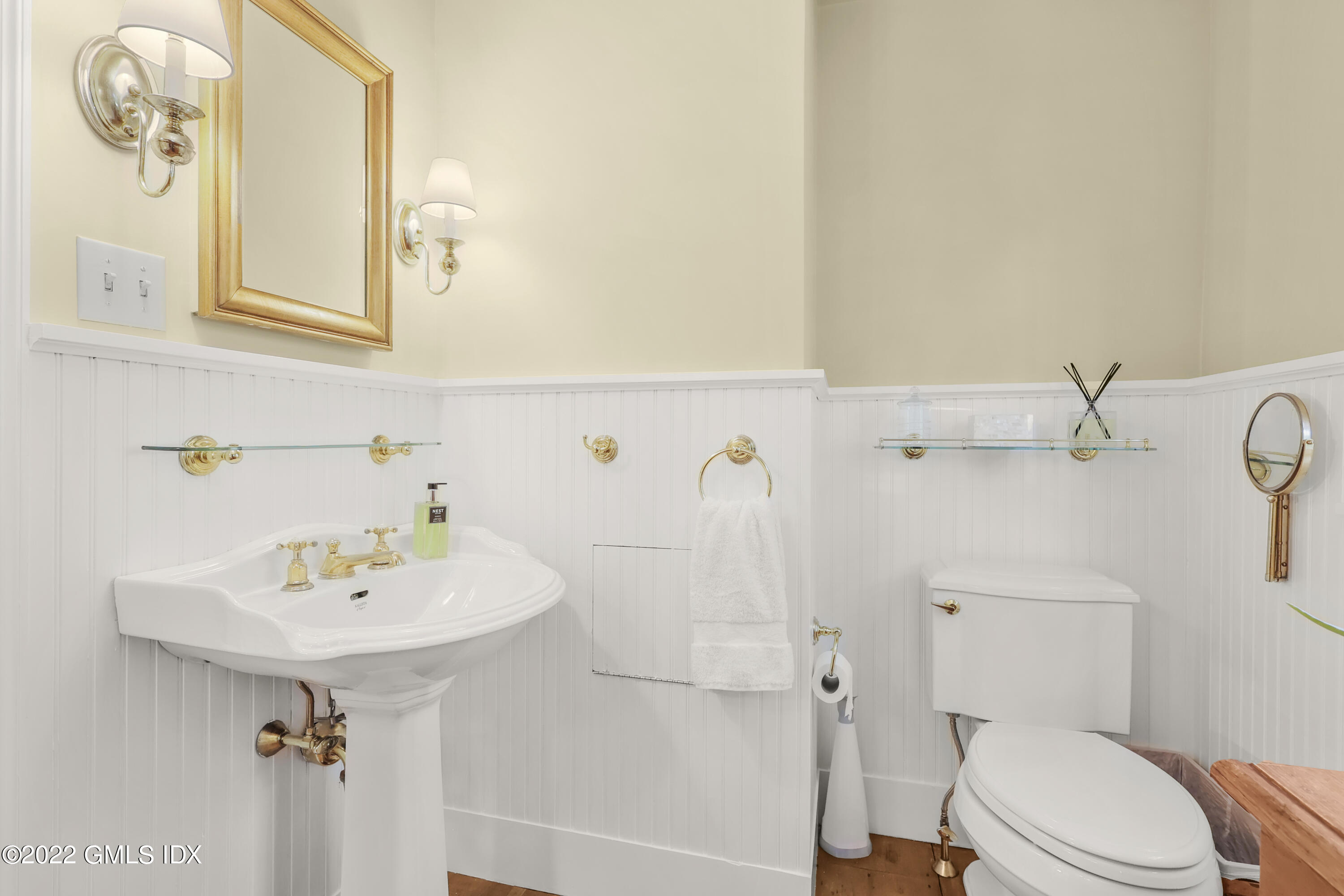 141 Hendrie Avenue Riverside, CT 06878 - Photo 22 of 34 a bathroom with a sink a toilet and shower