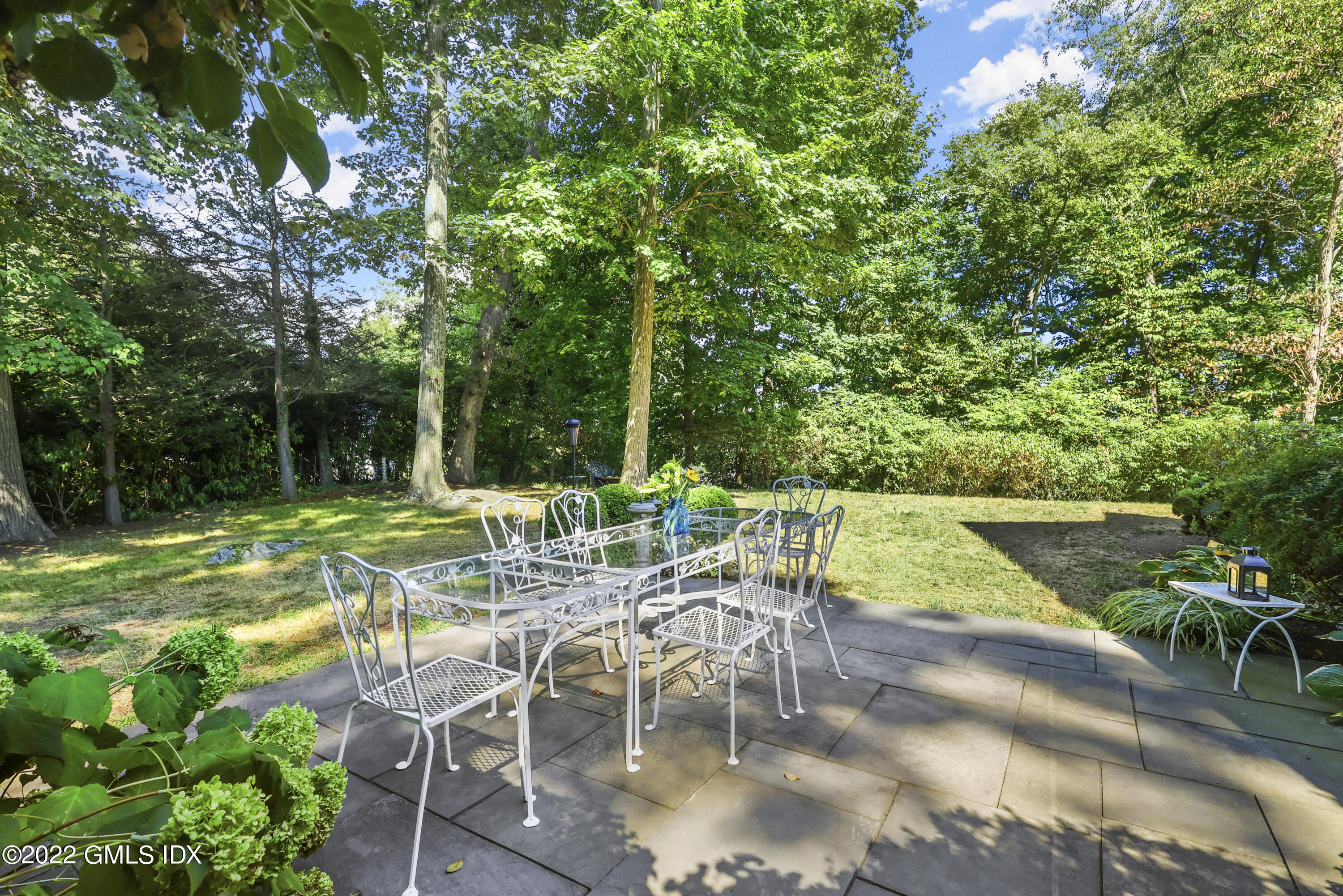 141 Hendrie Avenue Riverside, CT 06878 - Photo 30 of 34 a view of yard with seating area and green space